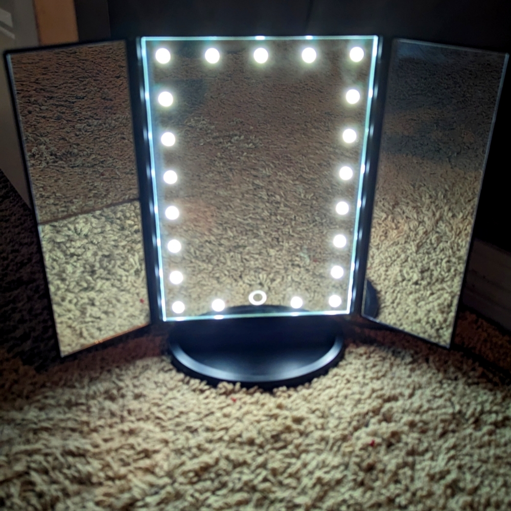 Lighted make-up mirror
